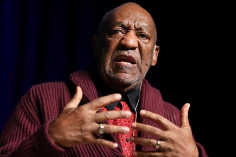 Cosby takes stage despite protest over sex-assault claims
