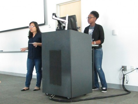 Central Student Library Advisory Council Secretary Thao Nguyen (left) and Treasurer Jessica White (right) address the Faculty Senate meeting on March 11 to ask instructors to use free, open sourced textbooks like OpenStaxs. 