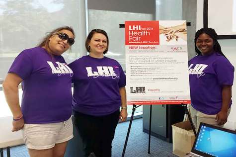 From left to right Rachel Alaniz, Juanita Valdes and Aurora Harris volunteers for LHI at the Coming Out Day hosted by OUTSA.
Photo by John Cañamar