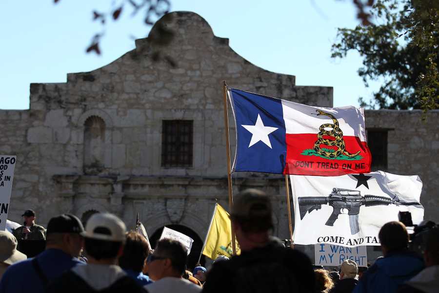+In+this+Oct.+19%2C+2013++photo%2C+flags+fly+at+the+Come+And+Take+It+San+Antonio+rally.+Long+depicted+as+the+rootin-tootin+capital+of+American+gun+culture%2C+Texas+is+one+of+the+few+states+with+an+outright+ban+on+the+open+carry+of+handguns.+That+could+change+next+year%2C+with+an+expected+push+for+expanding+gun+rights+from+the+Republican-dominated+Legislature.