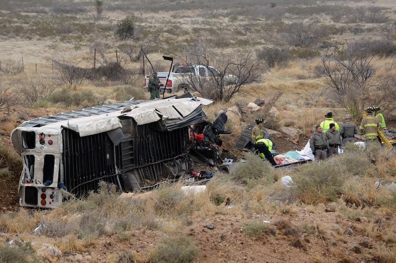 Officials+investigate+the+scene+of+a+prison+transport+bus+crash+in+Penwell%2C+Texas%2C+Wednesday.+Law+enforcement+officials+said+the+bus+carrying+prisoners+and+corrections+officers+fell+from+an+overpass+in+West+Texas+and+crashed+onto+train+tracks+below%2C+killing+an+unspecified+number+of+people.+