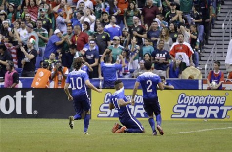 USA forward Juan Agudelo (17) celebrates a goal with teammates Mix Diskerud (10) and DeAndre Yedlin during the second half of an international friendly soccer match against Mexico, Wednesday, April 15, 2015, in San Antonio. United States won 2-0. 