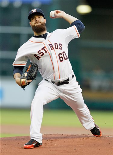 Houston Astros pitcher Dallas Keuchel throws in the first inning against the Texas Rangers in a baseball game Monday May 4, 2015