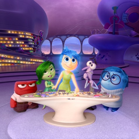 In this image released by Disney-Pixar, characters, from left, Anger, voiced by Lewis Black, Disgust, voiced by Mindy Kaling, Joy, voiced by Amy Poehler, Fear, voiced by Bill Hader, and Sadness, voiced by Phyllis Smith appear in a scene from Inside Out.