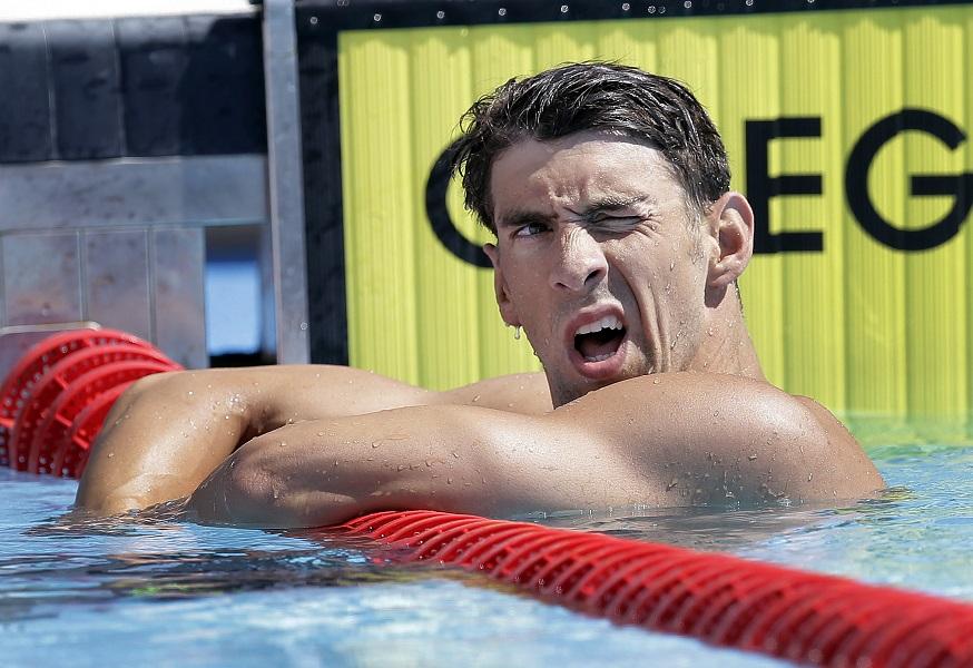 Michael Phelps checks the board for his time after he competed in the preliminary round of the mens 200-meter breaststroke at the the U.S. swimming nationals, Monday, Aug. 10, in San Antonio.