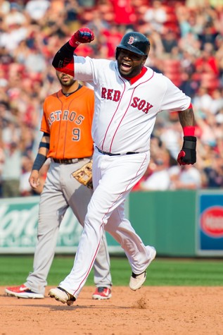 David Ortiz trots around the bases after blasting a homerun at Fenway Park on July 5, 2015