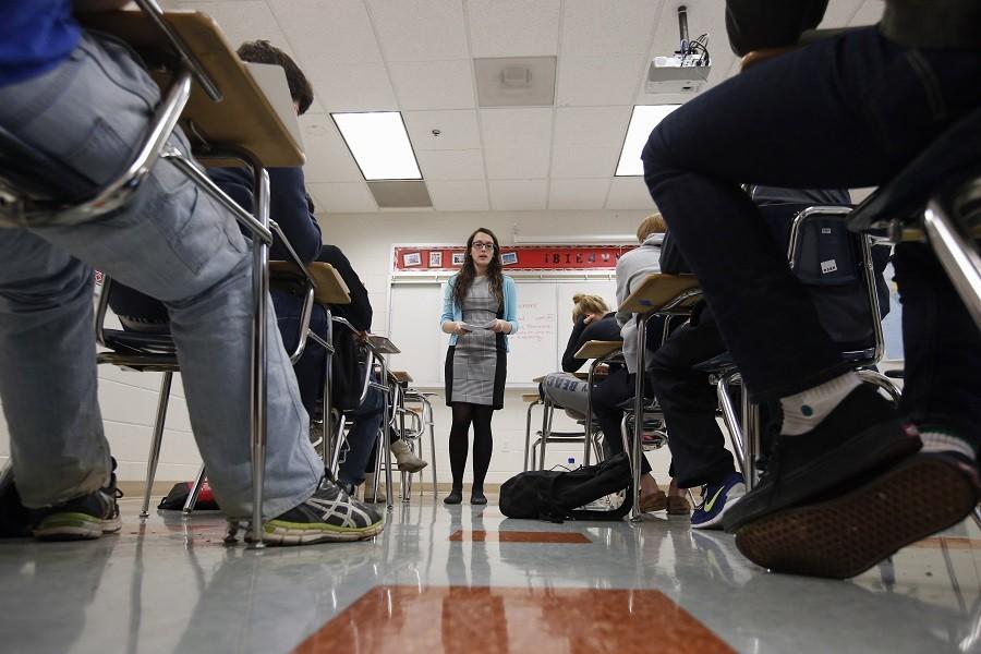 Katerina Maylock, with Capital Educators, teaches a college test preparation class at Holton Arms School in Bethesda. (AP Photo/Alex Brandon)