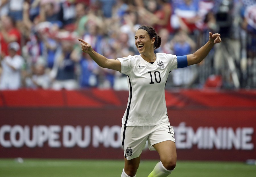 In this Sunday, July 5, 2015 file photo, Carli Lloyd of the U.S celebrates scoring her third goal against Japan during the first half of the FIFA Womens World Cup soccer championship in Vancouver, British Columbia, Canada. (AP Photo/Elaine Thompson, File)