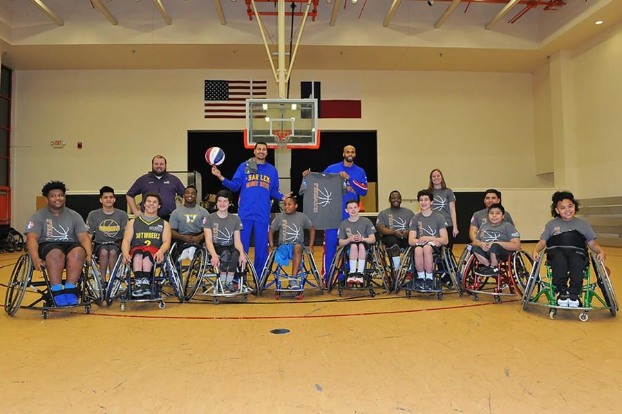 TIRR 1 Hotwheels with Globetrotter members El Gato Melendez and Hawk Thomas.