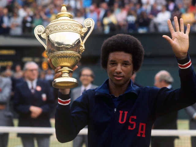 Arthur Ashe with the Wimbledon trophy after winning the mens singles on July 5, 1975.