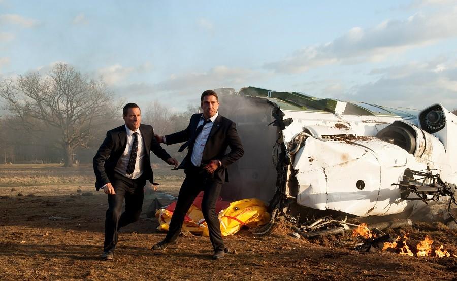 This image released by Focus Features shows Aaron Eckhart, left, and Gerard Butler in a scene from Grammercy Pictures, London Has Fallen. 