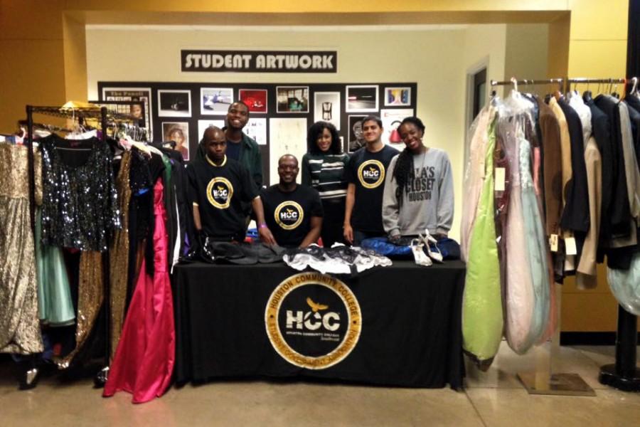 Members+of+Houston+Community+Colleges+Southwest+Student+Government+Association+pose+for+a+photo+with+the+prom+clothes+collected+from+HCC+students+for+Mias+Closet.+The+clothes+will+help+underprivileged+youth+afford+their+prom.+