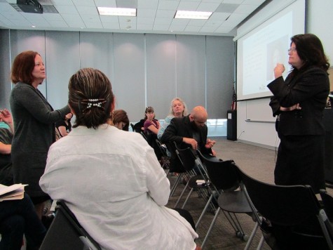 Board Chair Adriana Tamez answers instructors' questions at the Faculty Senate meeting March 11. 