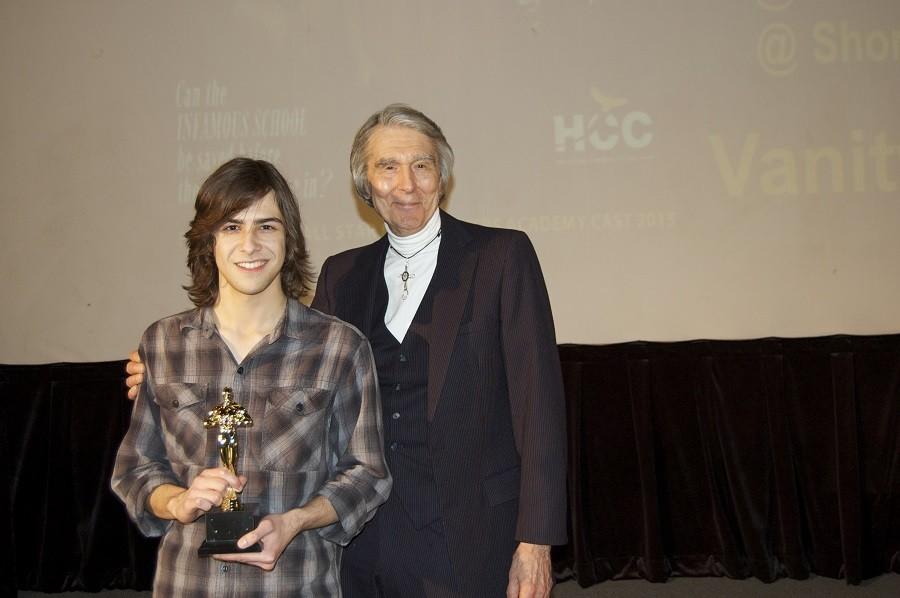 HCC Movie Makers Academy founder Professor Rick Harrington (right) poses with HCC Academy Award winner Jeff Novac (left) for his film Interstellar, at the awards ceremony on March 12 at the HCC Spring Branch campus. 