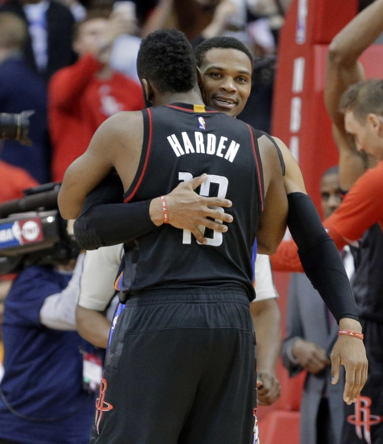 Houston Rockets James Harden (13) hugs his former teammate, Oklahoma City Thunders Russell Westbrook after an NBA basketball game in Houston, Thursday Jan. 5, 2017. The Rockets defeated the Thunder 118-116. (AP Photo/Michael Wyke)