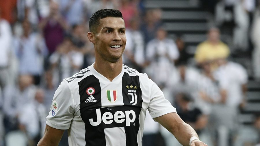 Ronaldo smiling while playing against Lazio at a Juventus Serie A home game. This was his first home game with Juventus after leaving Real Madrid.
