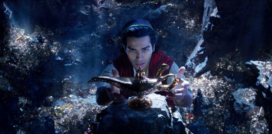 This image released by Disney shows Mena Massoud as Aladdin in Disneys live-action adaptation of the 1992 animated classic Aladdin. (Disney via AP)