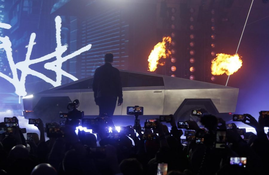 Tesla CEO Elon Musk introduces the Cybertruck at Teslas design studio Thursday, Nov. 21, 2019, in Hawthorne, Calif. (AP Photo/Ringo H.W. Chiu)