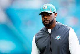Brian Flores as the former head coach of the Miami Dolphins
