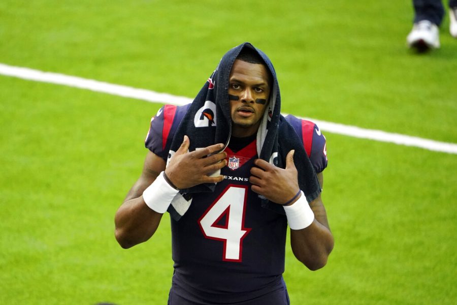 FILE - Houston Texans quarterback Deshaun Watson walks off the field before an NFL football game against the Tennessee Titans Sunday, Jan. 3, 2021, in Houston. Clevelands blockbuster trade for the legally entangled quarterback became official Sunday, when the Browns finalized the complex deal and released statements from owners Dee and Jimmy Haslam explaining their decision to add him to their roster following the teams own extensive investigation. (AP Photo/Eric Christian Smith, File)