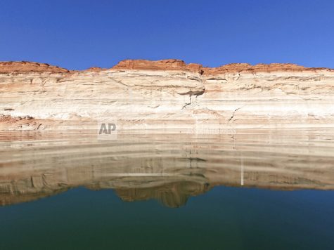 Bathtub rings show how low Lake Powell levels have dropped Wednesday, June 8, 2022, in Page, Ariz. (AP Photo/Brittany Peterson)
