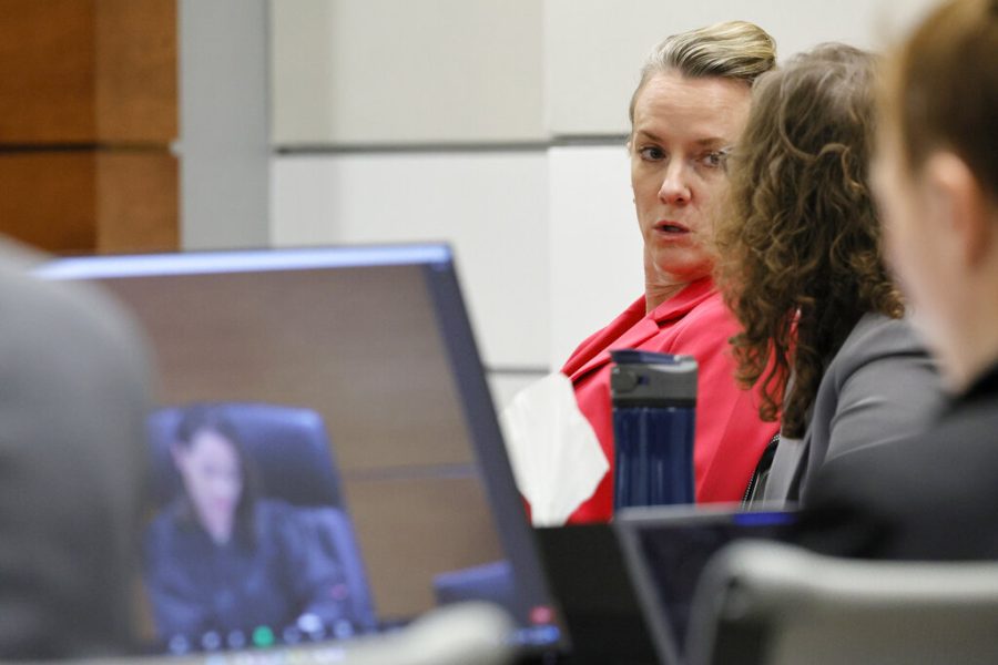 Assistant Public Defenders Melisa McNeill, left, and Tamara Curtis speak after Judge Elizabeth Scherer called McNeill "unprofessional" when McNeill announced the defense's intention to rest their case during the penalty phase of the trial of Marjory Stoneman Douglas High School shooter Nikolas Cruz at the Broward County Courthouse in Fort Lauderdale on Wednesday, Sept. 14, 2022. Cruz previously plead guilty to all 17 counts of premeditated murder and 17 counts of attempted murder in the 2018 shootings. (Amy Beth Bennett/South Florida Sun Sentinel via AP, Pool)