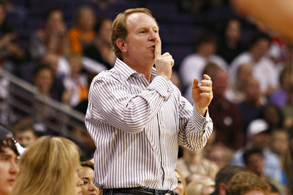 Phoenix Suns owner Robert Sarver gestures to Indiana Pacers Danny Granger after Granger missed a shot during the second half of an NBA basketball game Saturday, March 6, 2010 in Phoenix. Robert Sarver says he has started the process of selling the Phoenix Suns and Phoenix Mercury, a move that comes only eight days after he was suspended by the NBA over workplace misconduct including racist speech and hostile behavior toward employees. Sarver made the announcement Wednesday, Sept. 21, 2022, saying selling “is the best course of action.” He has owned the teams since 2004.
