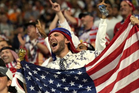 Supporters cheer on the stands before the World Cup round of 16 soccer match between the Netherlands and the United States, at the Khalifa International Stadium in Doha, Qatar, Saturday, Dec. 3, 2022