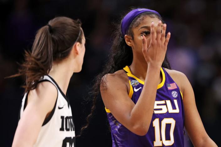 Angel+Reese+of+the+LSU+Tigers+reacts+toward+Caitlin+Clark+of+the+Iowa+Hawkeyes+during+the+fourth+quarter+of+the+2023+NCAA+Women%E2%80%99s+Basketball+Tournament+championship+game.