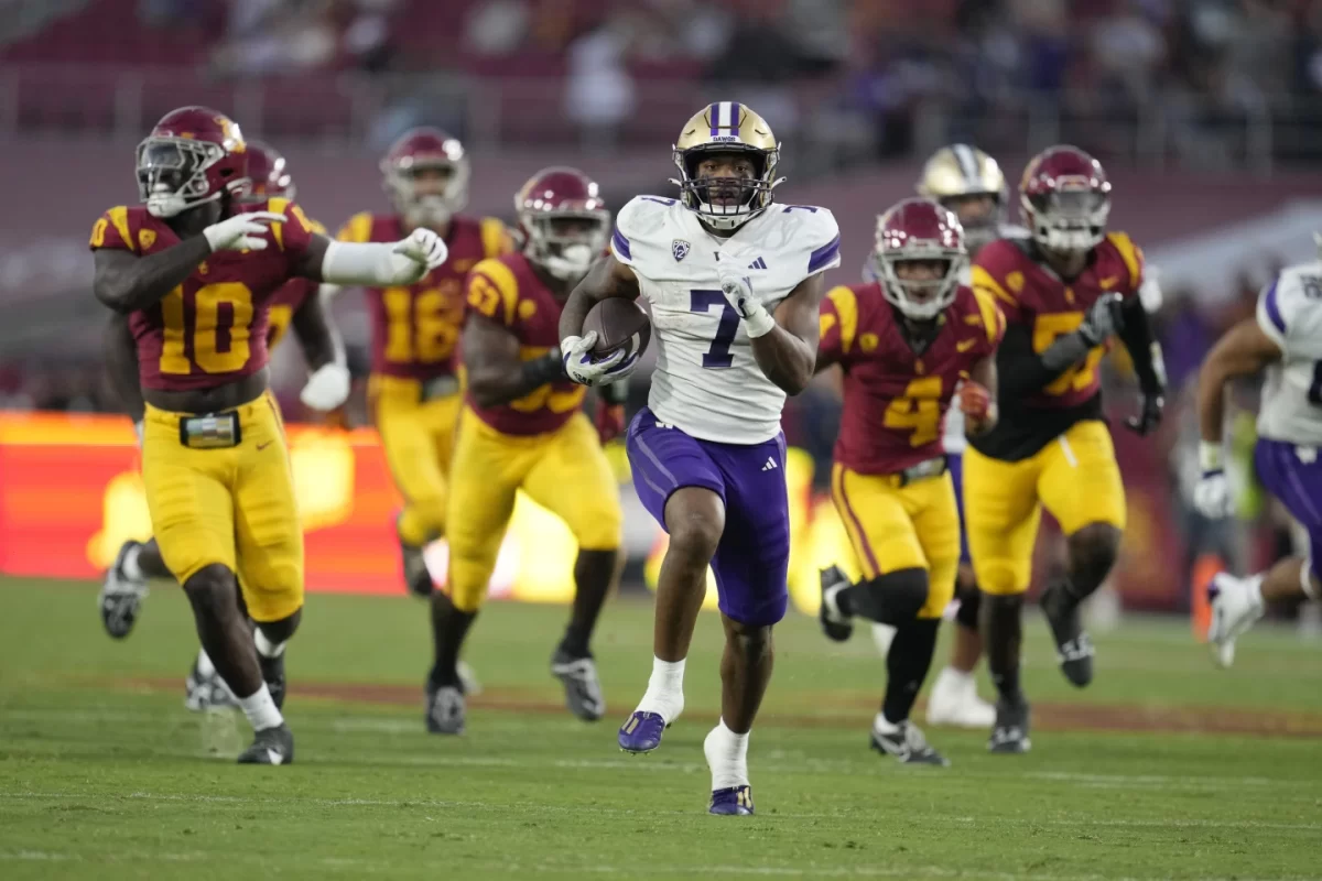 Washington running back Dillion Johnson runs for a touchdown against USC in 52-42 win in Los Angeles