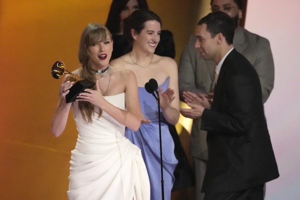 Taylor Swift accepts the award for album of the year for MIdnights during the 66th annual Grammy Awards on Sunday, Feb. 4, 2024, in Los Angeles.