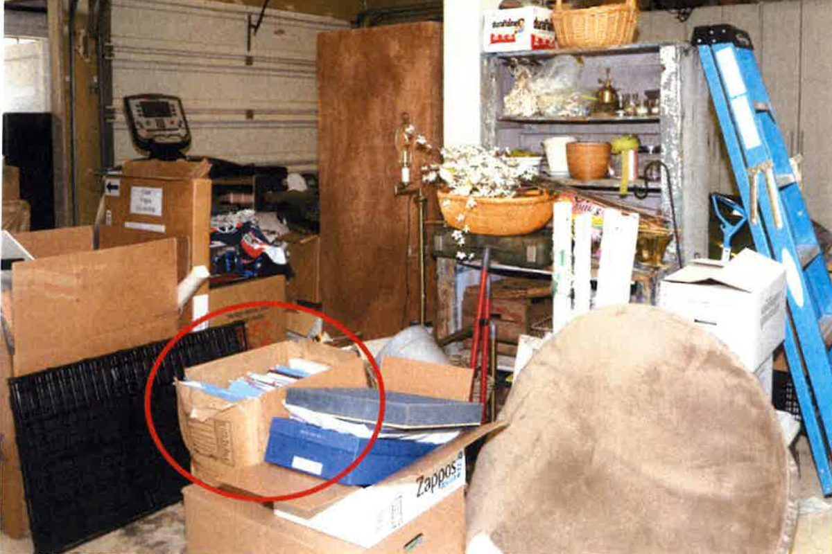 This image, contained in the report from special counsel Robert Hur, shows the box where classified Afghanistan documents were found in the garage of President Joe Biden in Wilmington, Del., during a search by the FBI on Dec. 21, 2022. (Justice Department via AP)