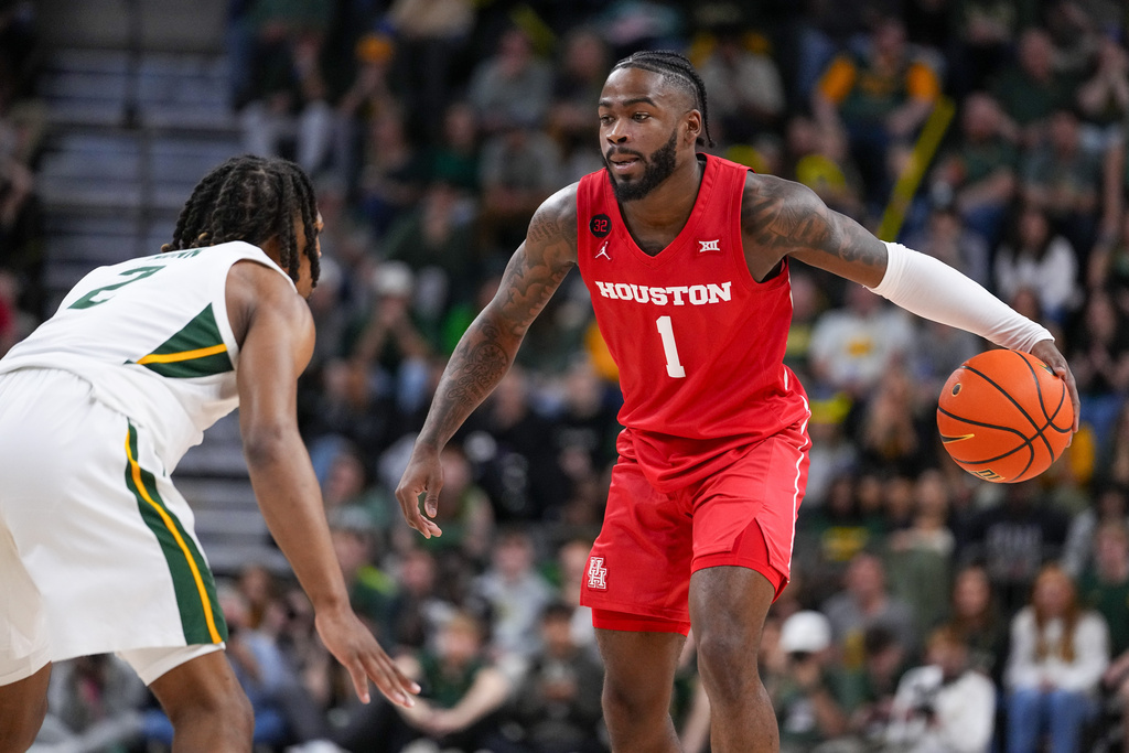 Houston guard Jamal Shead (1) works the floor against Baylor guard Jayden Nunn (2) during the second half of an NCAA college basketball game, Saturday, Feb. 24, 2024 in Waco, Texas. Houston won 82-76 in overtime. 
