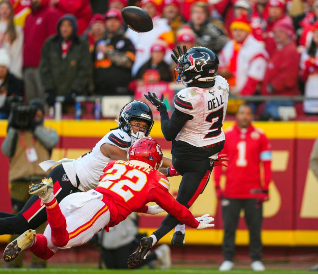 Houston Texans wide receiver Tank Dell catches a touchdown pass against Kansas City Chiefs cornerback Trent McDuffie during second hald.