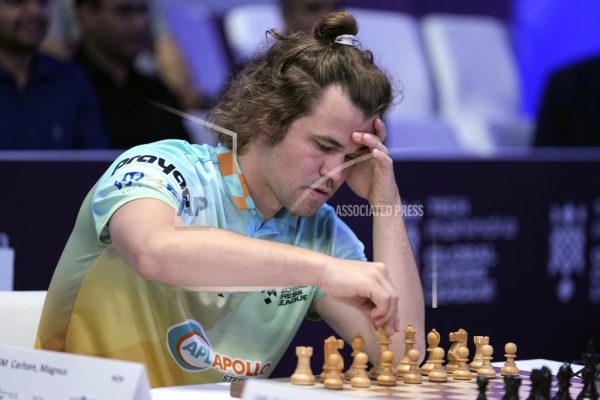 Norwegian Magnus Carlsen, left, of SG Alpine Warriors plays against Poland's Jan-Krzysztof Duda of Chingari Gulf Titans during Global Chess League in Dubai United Arab Emirates, on July 1, 2023.