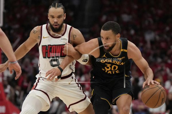 Golden State Warriors' Stephen Curry (30) is fouled by Houston Rockets' Dillon Brooks (9) during the second half of Game 7 of an NBA basketball first-round playoff series Sunday, May 4, 2025, in Houston. 