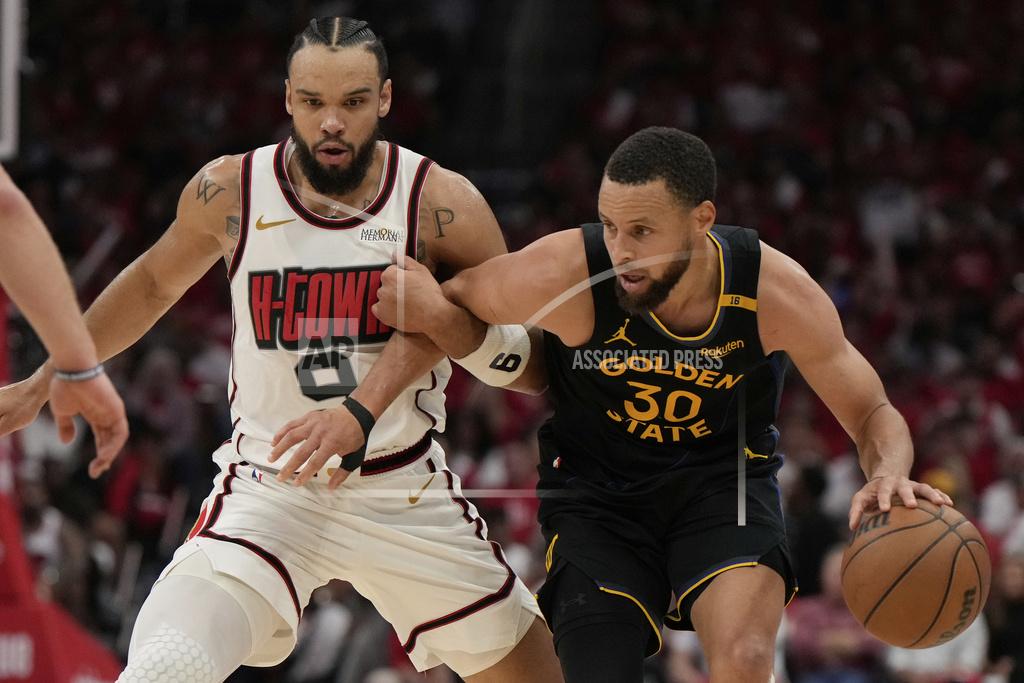 Golden State Warriors' Stephen Curry (30) is fouled by Houston Rockets' Dillon Brooks (9) during the second half of Game 7 of an NBA basketball first-round playoff series Sunday, May 4, 2025, in Houston. 