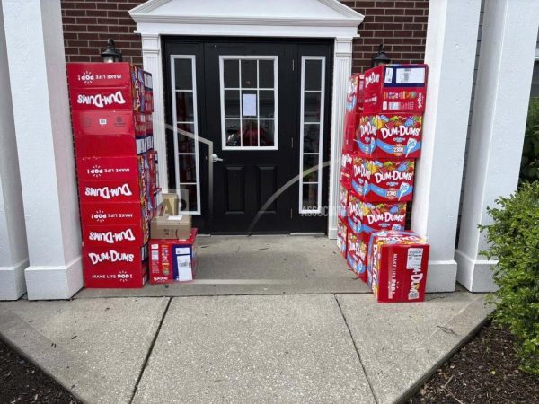This image provided by Holly LaFavers shows boxes of Dum-Dum lollipops in the garage at Holly LaFavers's home Monday, May 5, 2025, in Lexington, Ky. 