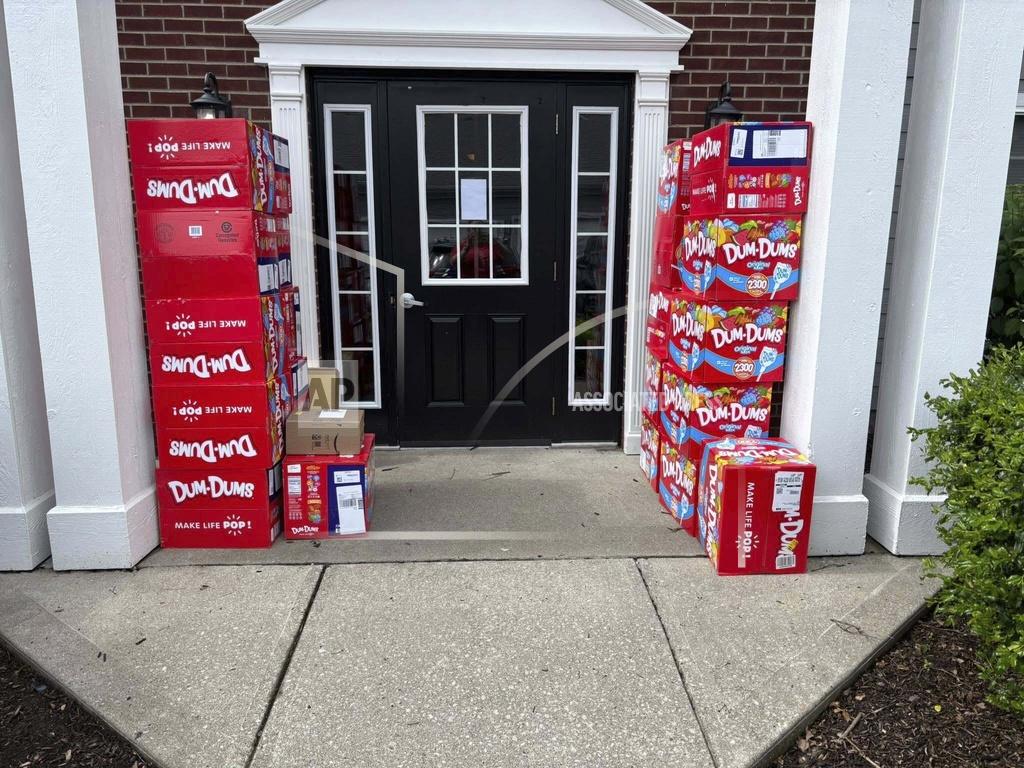 This image provided by Holly LaFavers shows boxes of Dum-Dum lollipops in the garage at Holly LaFavers's home Monday, May 5, 2025, in Lexington, Ky. 