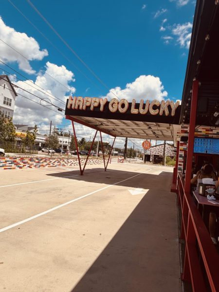 The drive-thru at Happy Go Lucky offers a convenient way for customers to enjoy shaved ice without leaving their car, making it easy to cool off on the go.