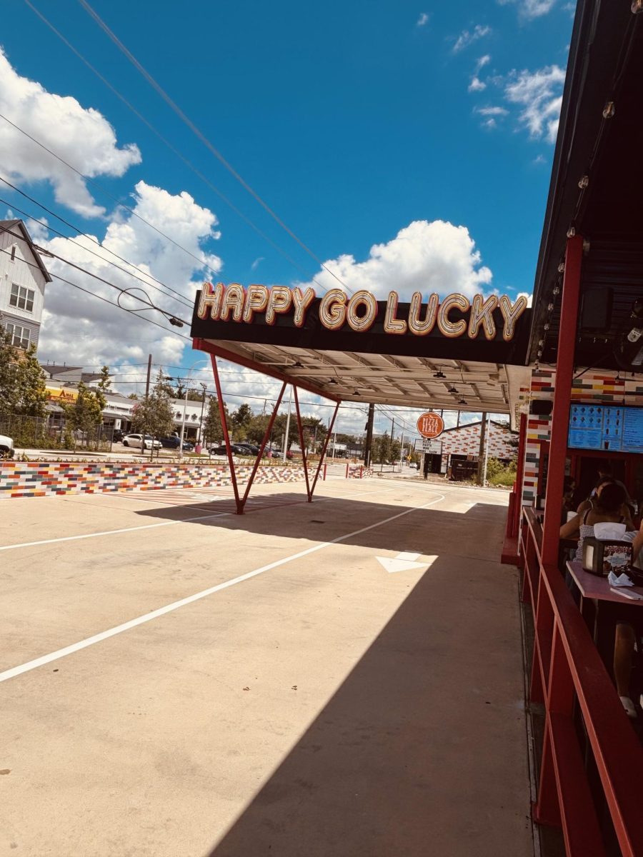 The drive-thru at Happy Go Lucky offers a convenient way for customers to enjoy shaved ice without leaving their car, making it easy to cool off on the go.