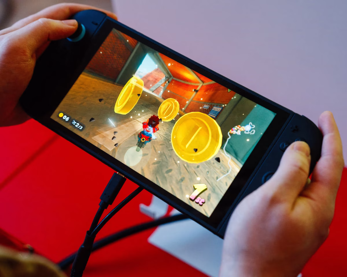 ‘It will sell squillions’ … a gamer plays Mario Kart World on the new Nintendo Switch in Paris ahead of the console’s launch.