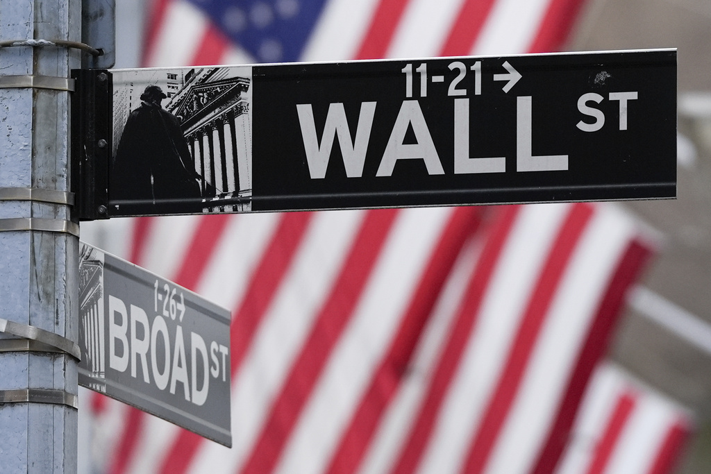 A sign outside the New York Stock Exchange marks the intersection of Wall and Broad Streets (AP Photo/Julia Demaree Nikhinson, File)