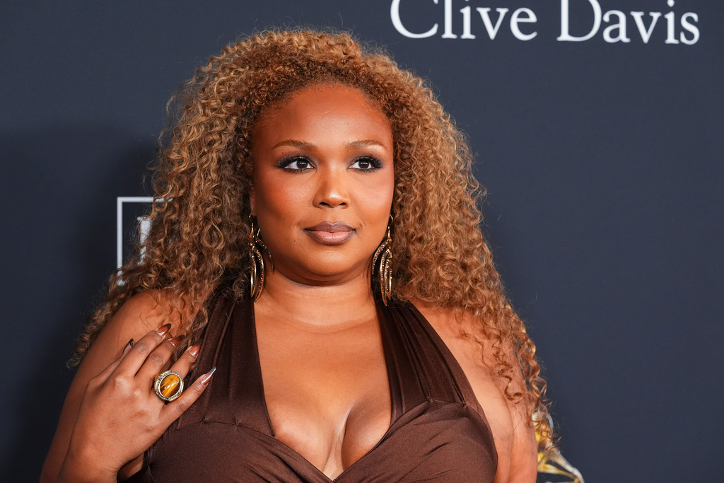 Lizzo arrives at the Pre-Grammy Gala on Saturday, Jan. 31, 2026, at the Beverly Hilton Hotel in Beverly Hills, Calif. (AP Photo/Chris Pizzello)
