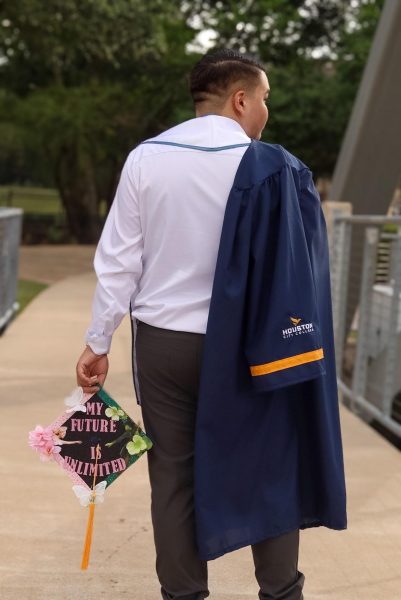 After returning to college later than expected, Jacob Alidon graduates in cap and gown, proving persistence pays off.