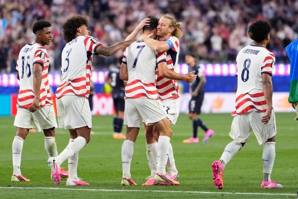 United States' Giovanni Reyna, centre, is congratulated by teammates after scoring his team's fourth goal during the World Cup Group D soccer match between the United States and Paraguay in Inglewood, Calif., near Los Angeles, Friday, June 12, 2026. (AP Photo/Mark J. Terrill)
